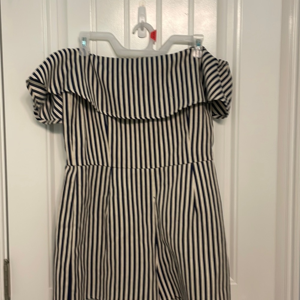 White and blue striped onesie.